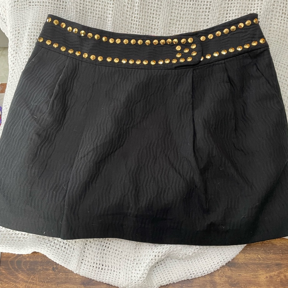 Milly of New York black mini skirt with gold tone studding at waist